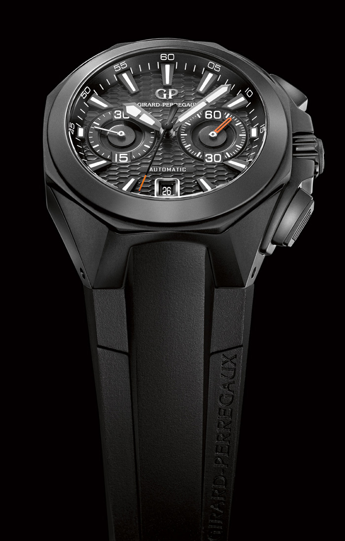 GIRARDPERREGAUX Watches World Chrono Hawk Cerámica negra Referencia 49970 32 631 FK6A Caja 44 mm de cerámica Cristal zafiro por ambos lados Hermeticidad 100 metros Movimiento mecánico automático calibre 11 ½ Frecuencia 28800 alth 4 Hz Reserva de marcha 46 h Funciones horas minutos fecha segundero pequeño cronógrafo Correa caucho negro Cierre de titanio con tratamiento PVD con tapa de cerámica