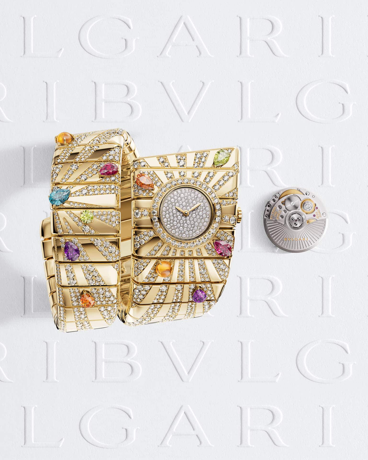 Bvlgari Tubogas Manchette presentado en la LVMH Watch Week 2026 Watches World Tubogas Manchette de Bvlgari en oro amarillo con diamantes y gemas de colores inspirado en un diseño de 1974 y su calibre