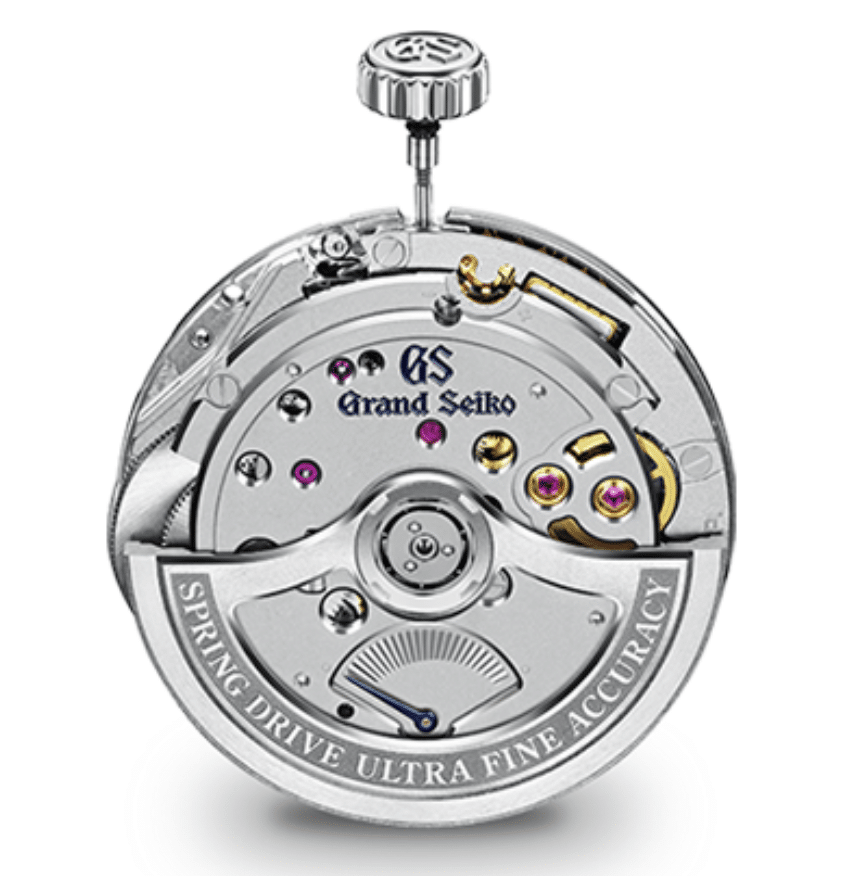 GRAND SEIKO Bosque de hielo al amanecer SLGB006CALIBRE Watches World Close up of a Grand Seiko Spring Drive watch movement showing gears and jewel bearings with Spring Drive Ultra Fine Accuracy inscription
