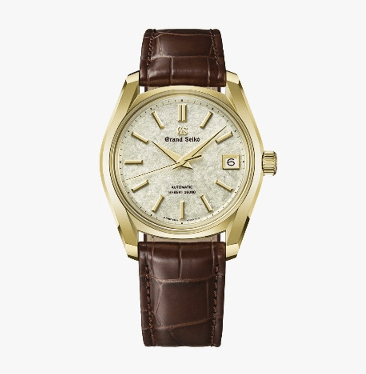 GRAND SEIKOColección Patrimonial Sakura Wakaba SBGH376COMPLETO Watches World Gold Grand Seiko wristwatch with a textured champagne dial brown leather strap and date window at 3 oclock