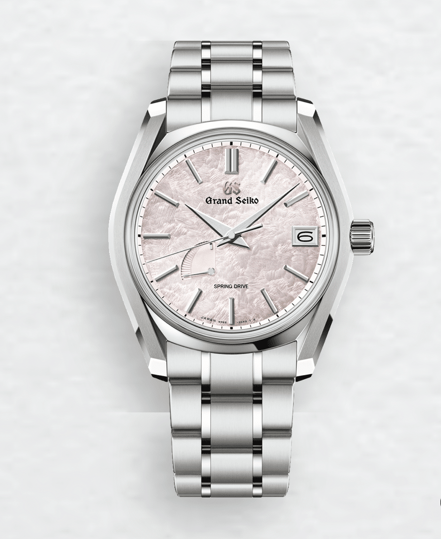 Grand Seiko 62GS Shunbun COMPLETO Watches World Grand Seiko stainless steel wristwatch with a pink textured dial silver indices date window at 3 oclock and brushed bracelet