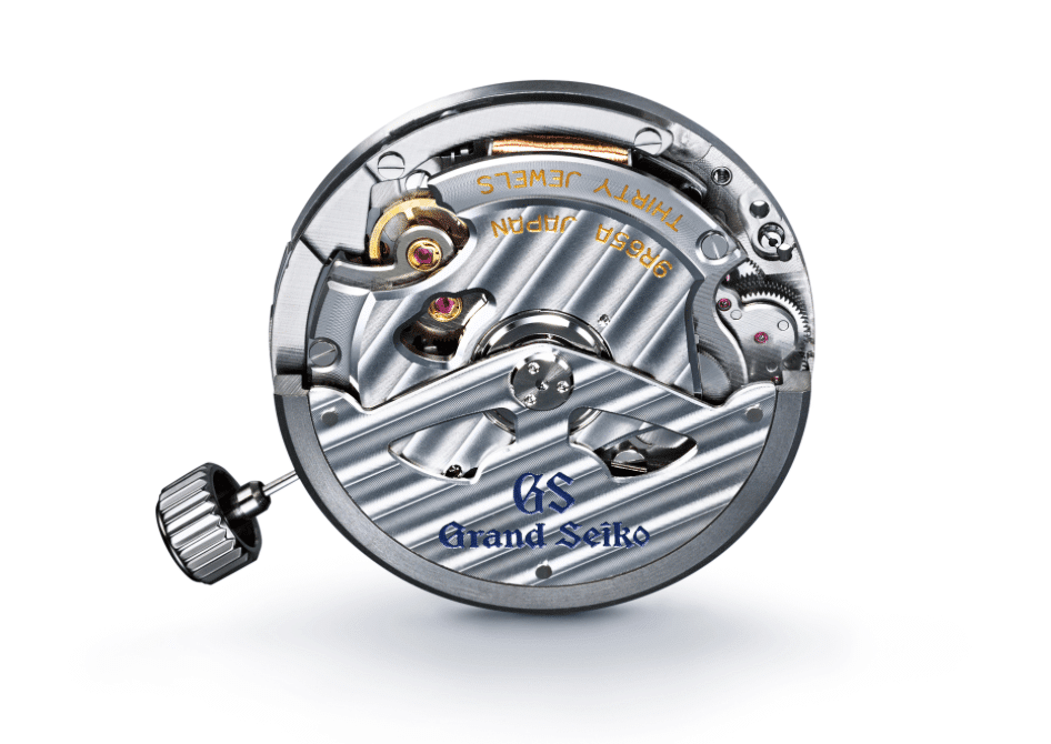 Grand Seiko 62GS Shunbuncalibre spring drive 9R65 Watches World Close up of a Grand Seiko watch movement with visible gears and decorative bridges including the crown on the left side