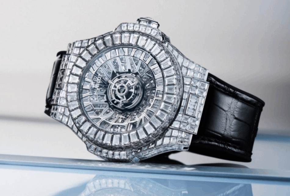 HUBLOTBig Bang Impact One MillionACOSTADO Watches World Diamond encrusted luxury wristwatch with a black leather strap resting on a reflective surface close up shot