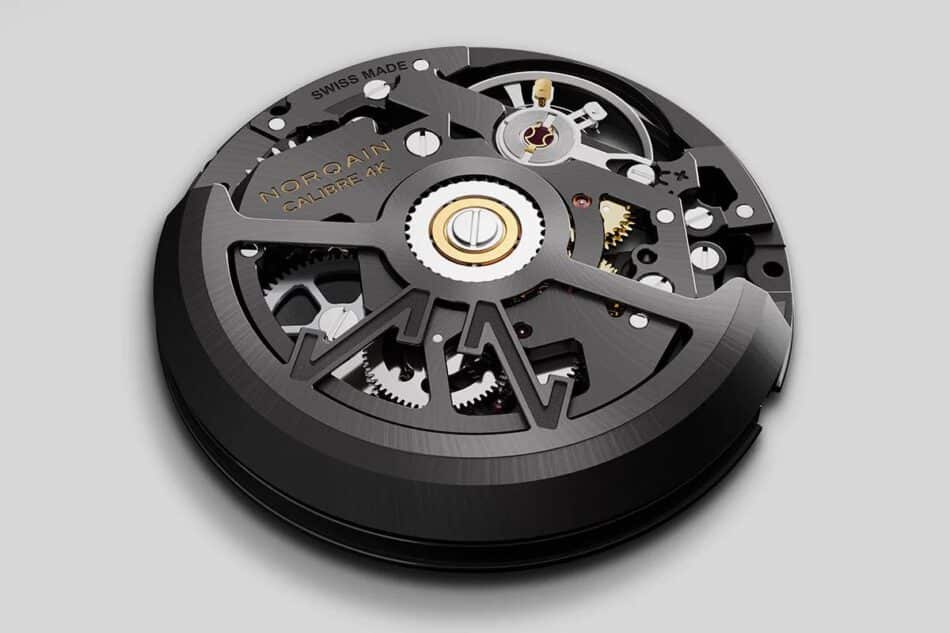 Norqain Wild ONE Skeleton XLite 2 Watches World Norqain Wild ONE Skeleton X Lite 3 NORTEQ el más ligero Close up of a black automatic watch movement with gears and a central rotor