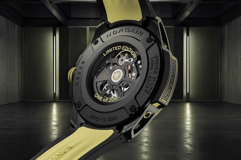 Norqain Wild ONE Skeleton XLite Watches World Back view of a black and gold Norqain watch showing the exposed movement Limited Edition and One of 200 inscriptions Swiss Made