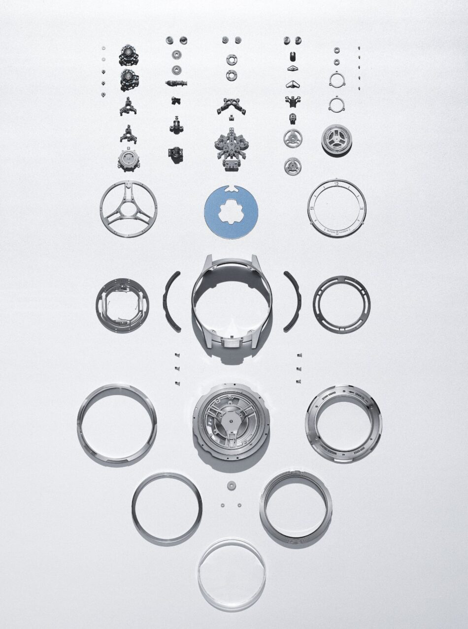 Ulysse Nardin Super Freak primer doble tourbillon automático del mundo nuevo sistema de cardán 2 Watches World Ulysse Nardin Super Freak primer doble tourbillon automático del mundo nuevo sistema de cardán 2 view of a watch with case gears and circular components spread in neat rows