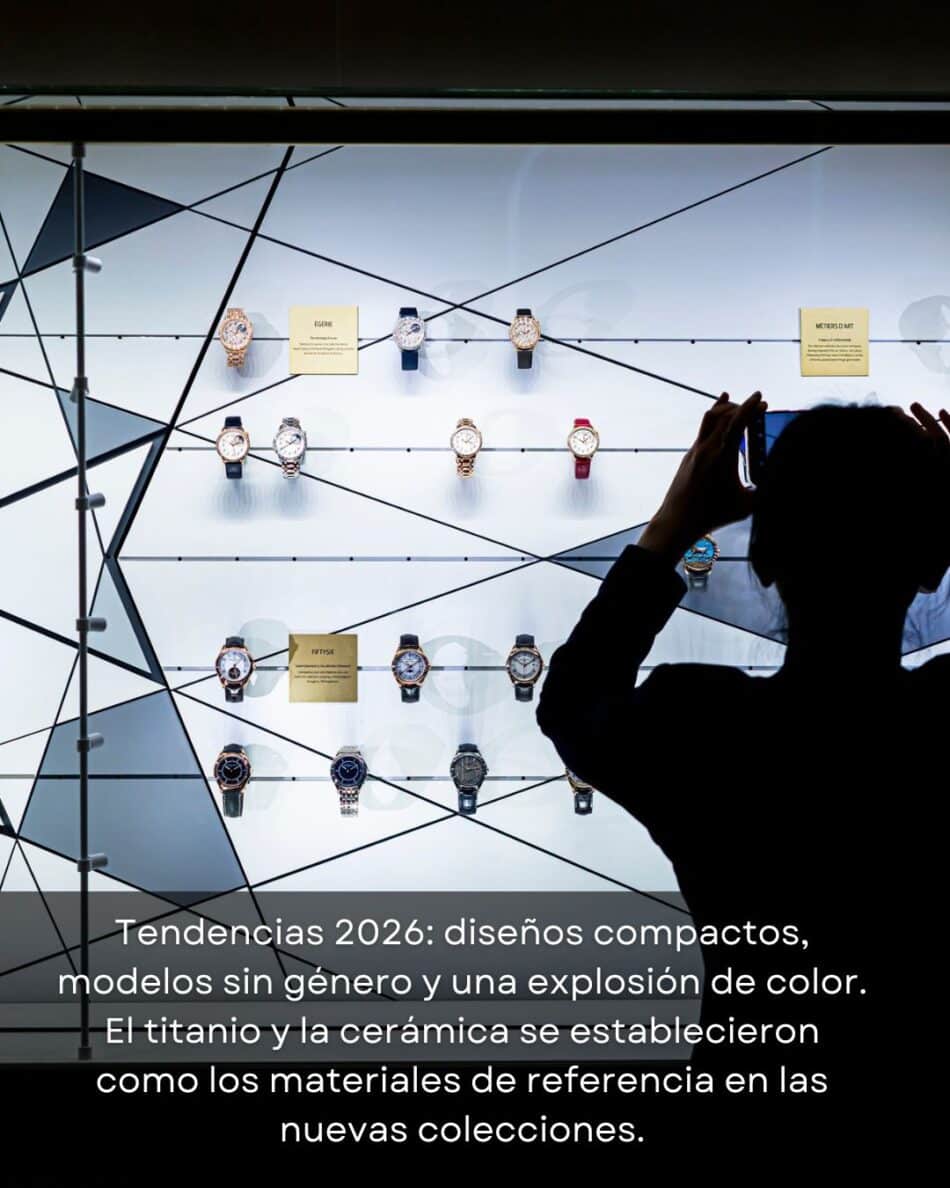 Watches and Wonders Geneva 2026 15 Watches World Watches and Wonders Geneva 2026 Silhouetted person taking a photo of a wall display with many wristwatches arranged on a geometric grid A Spanish caption about 2026 watch trends is visible at the bottom