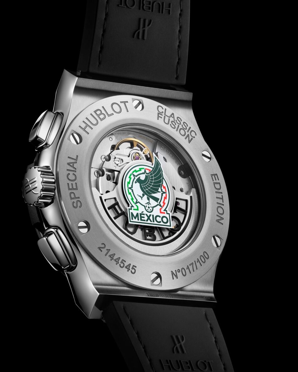 Hublot Classic Fusion Chronograph SNM Titanium 2 Watches World Hublot Classic Fusion Chronograph SNM Titanium 3 Back of a stainless steel Hublot Classic Fusion watch with visible movement through the transparent case back and a Mexico emblem sticker at the center