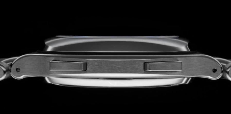 Laurent Ferrier Sport TravellerPERFIL Watches World Close up of a metal wristwatch showing two rectangular pushers on the side against a black background