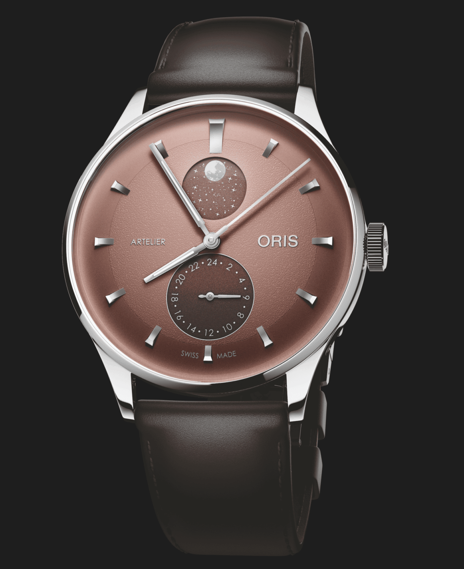 ORIS ARTELIER COMPLICATION 4 Watches World ORIS ARTELIER COMPLICATION 4 Close up of a rose gold dial wristwatch with a brown leather strap and silver indices showing a moon phase subdial and date ring
