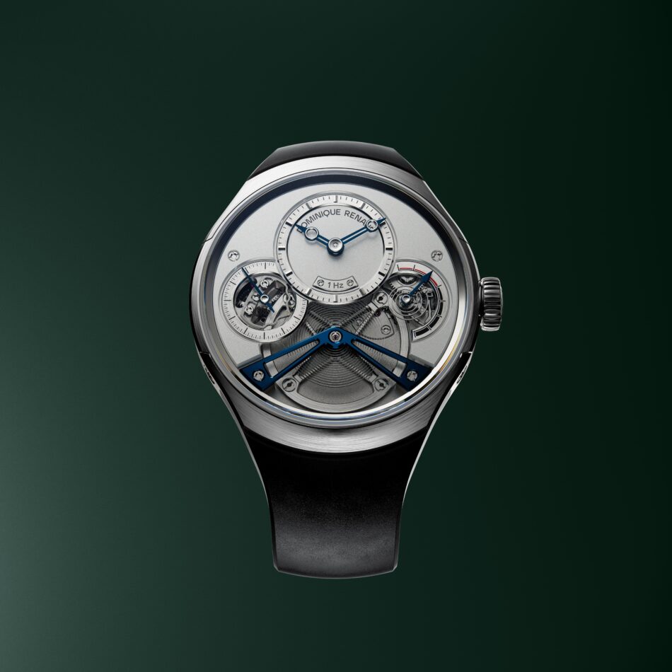 Pulse60PACKSHOT3 copia Watches World Partial view of a silver luxury watch face emerging from the bottom edge against a dark green background showing intricate gears