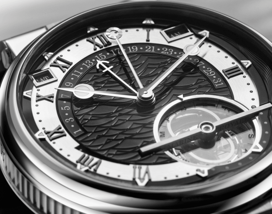 Breguet Marine Tourbillon Equation Marchante 5887 Watches World Close up of a luxury wristwatch face with Roman numerals and intricate mechanical detailing