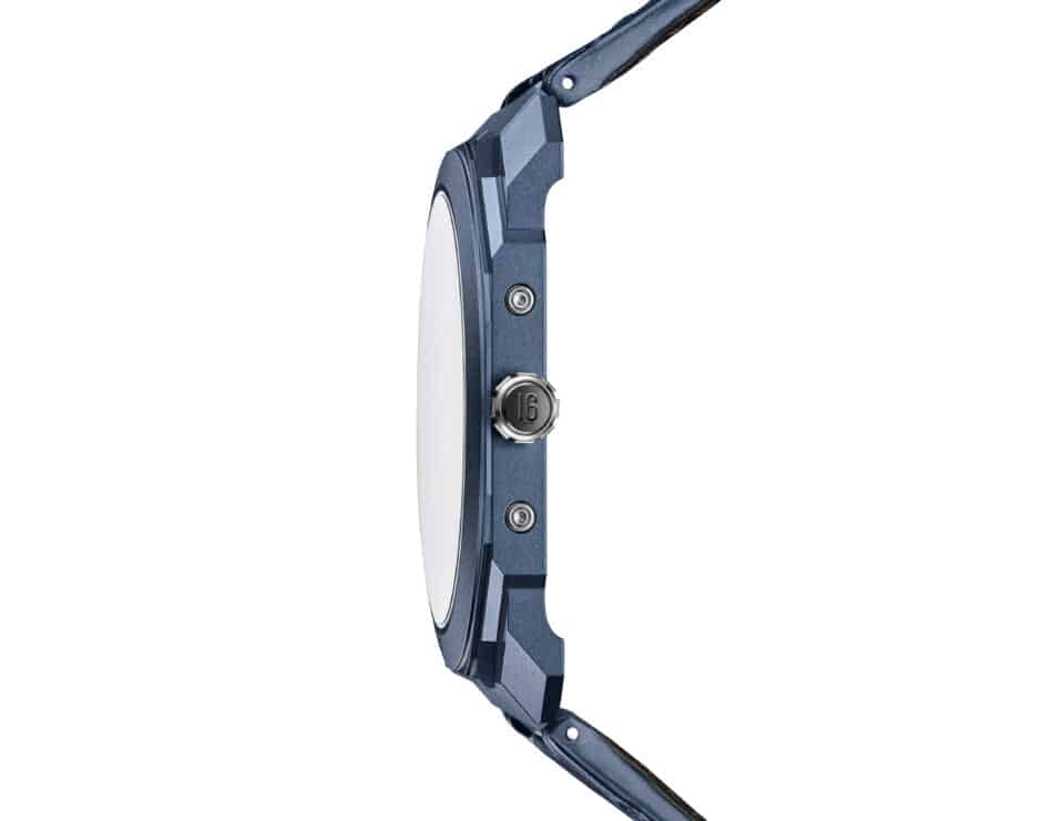 Bvlgari Octo Finissimo Perpetual Calendar Watches World Close up of a blue handheld utility knife with a retractable blade and metal dial at the side