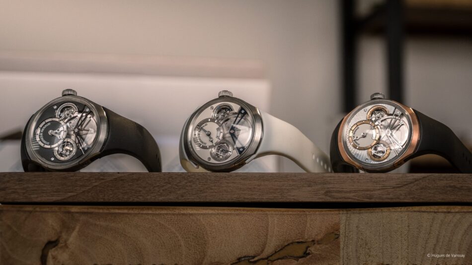 Dominique Renaud Pulse One Pulse60 Watches World Three luxury skeleton watches on a wooden shelf spread in a row black silver and rose gold