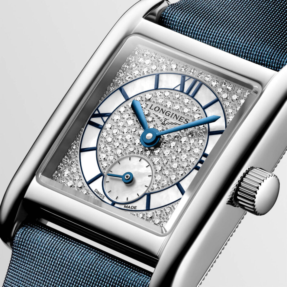 Longines presenta los Mini DolceVita más brillantes y sofisticados hasta la fecha Watches World Longines diamond studded rectangular wristwatch with blue hands and blue strap