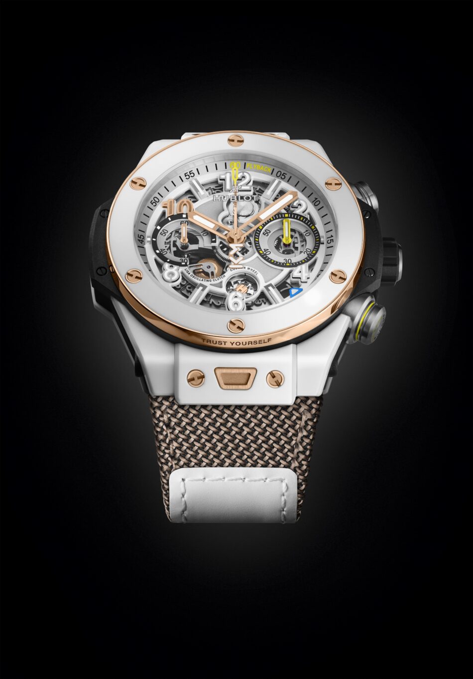 HublotBig Bang Reloaded Kylian Mbappé 2 Watches World Skeleton dial luxury wristwatch with white case rose gold bezel and visible gears white strap with a braided brown mesh underneath