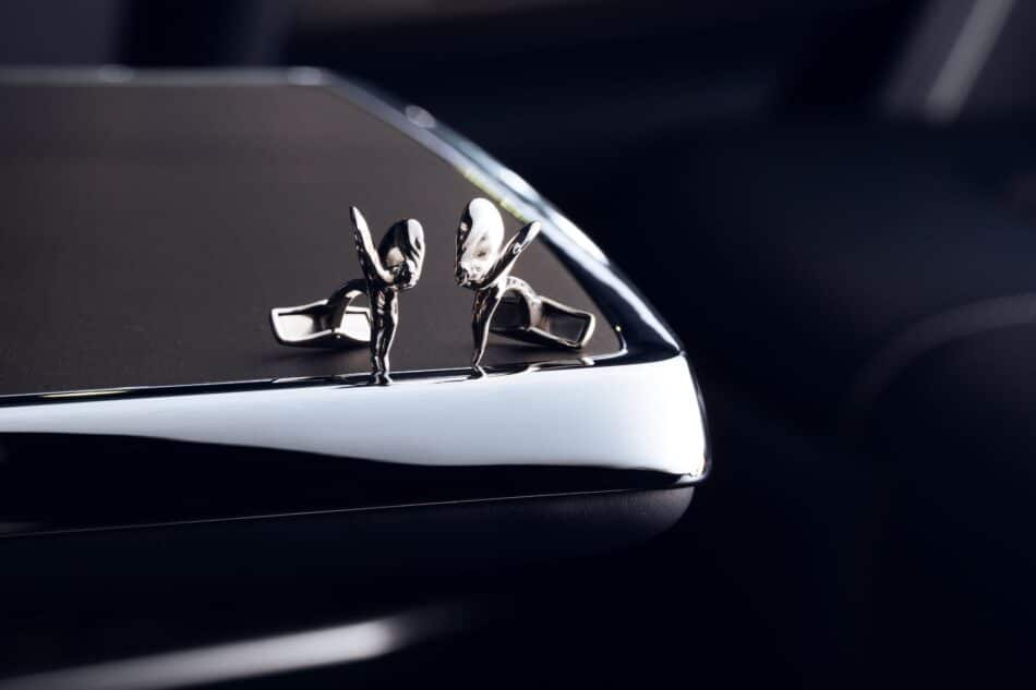 RollsRoyce Ghost Savile Row 12 Watches World Rolls Royce Ghost Savile Row Chrome hood ornament in the shape of a bird mounted on a dark car hood polished and reflective